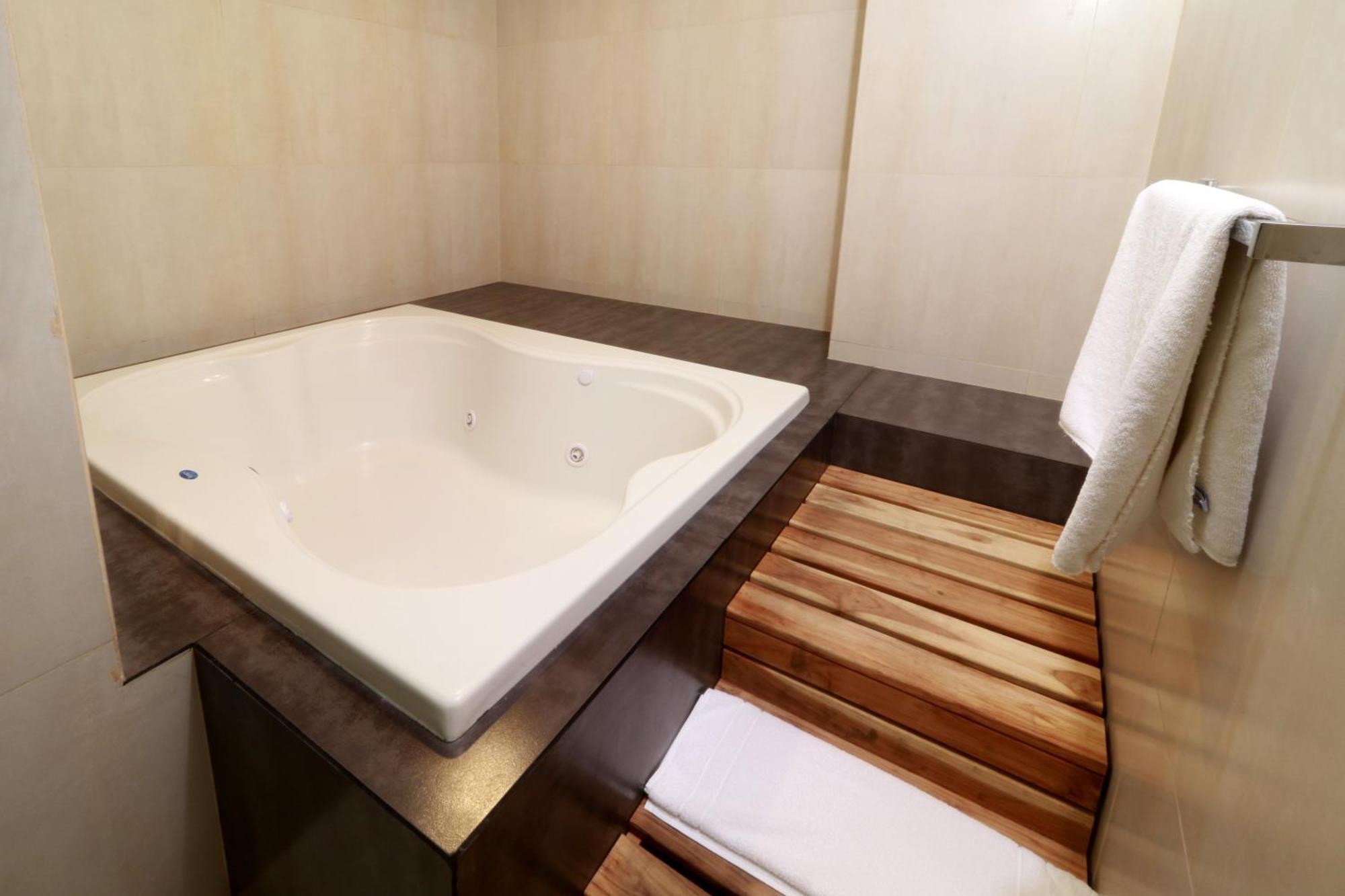Suite con cama extragrande